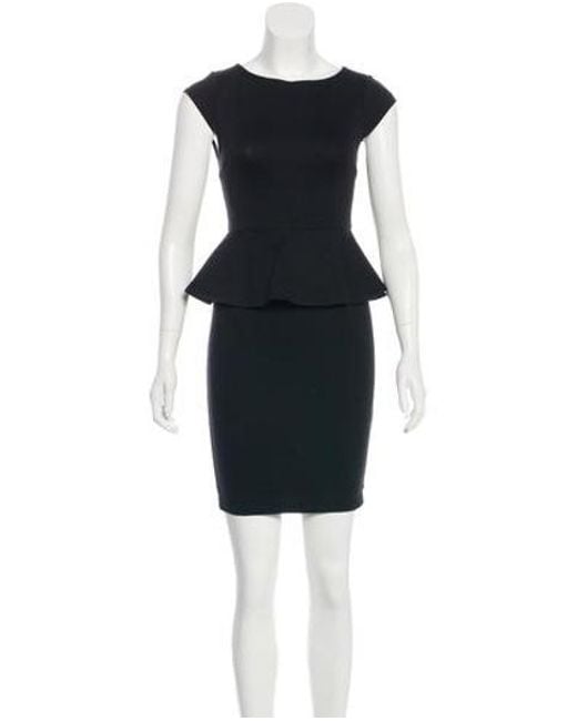 Black Knee Length Peplum Dress