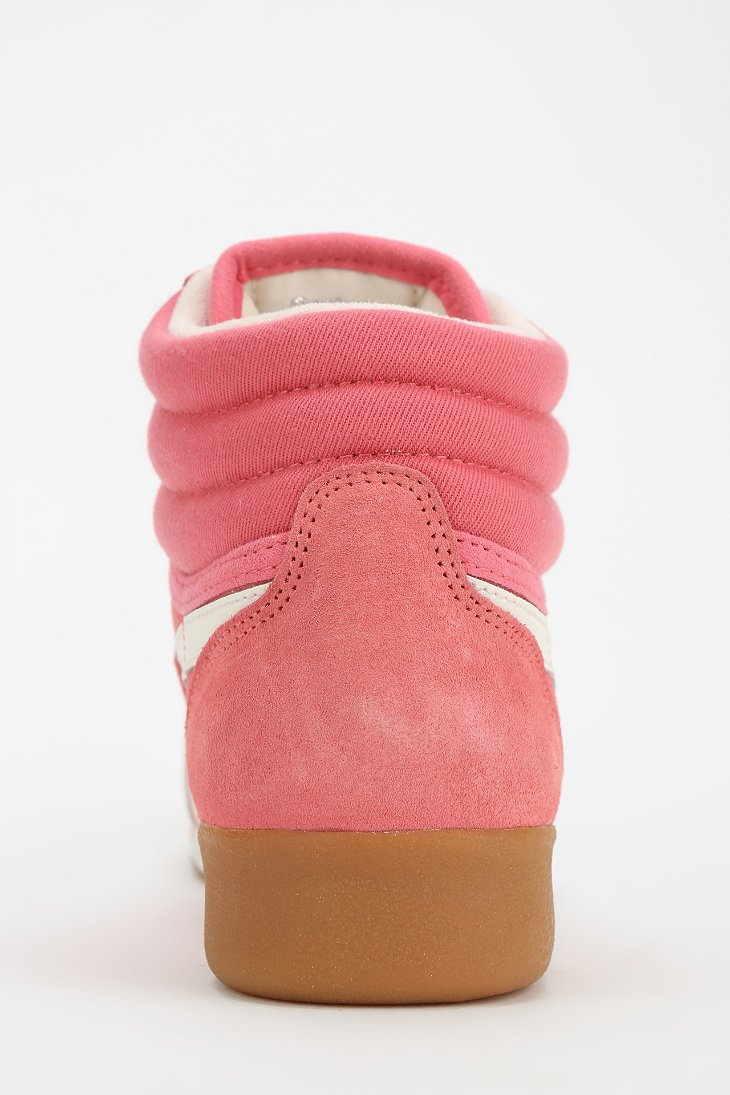 pink reebok high tops