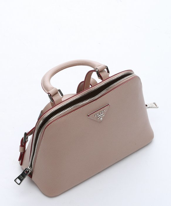popular leather purses - Prada Pale Pink Saffiano Leather Mini Backpack in Pink | Lyst