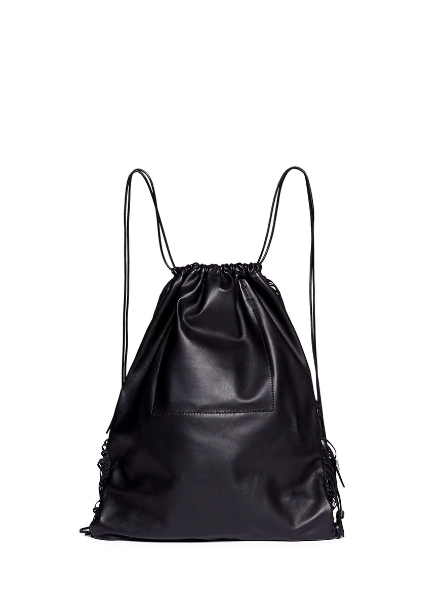 Lyst - Kara Fringe Leather Drawstring Backpack in Black