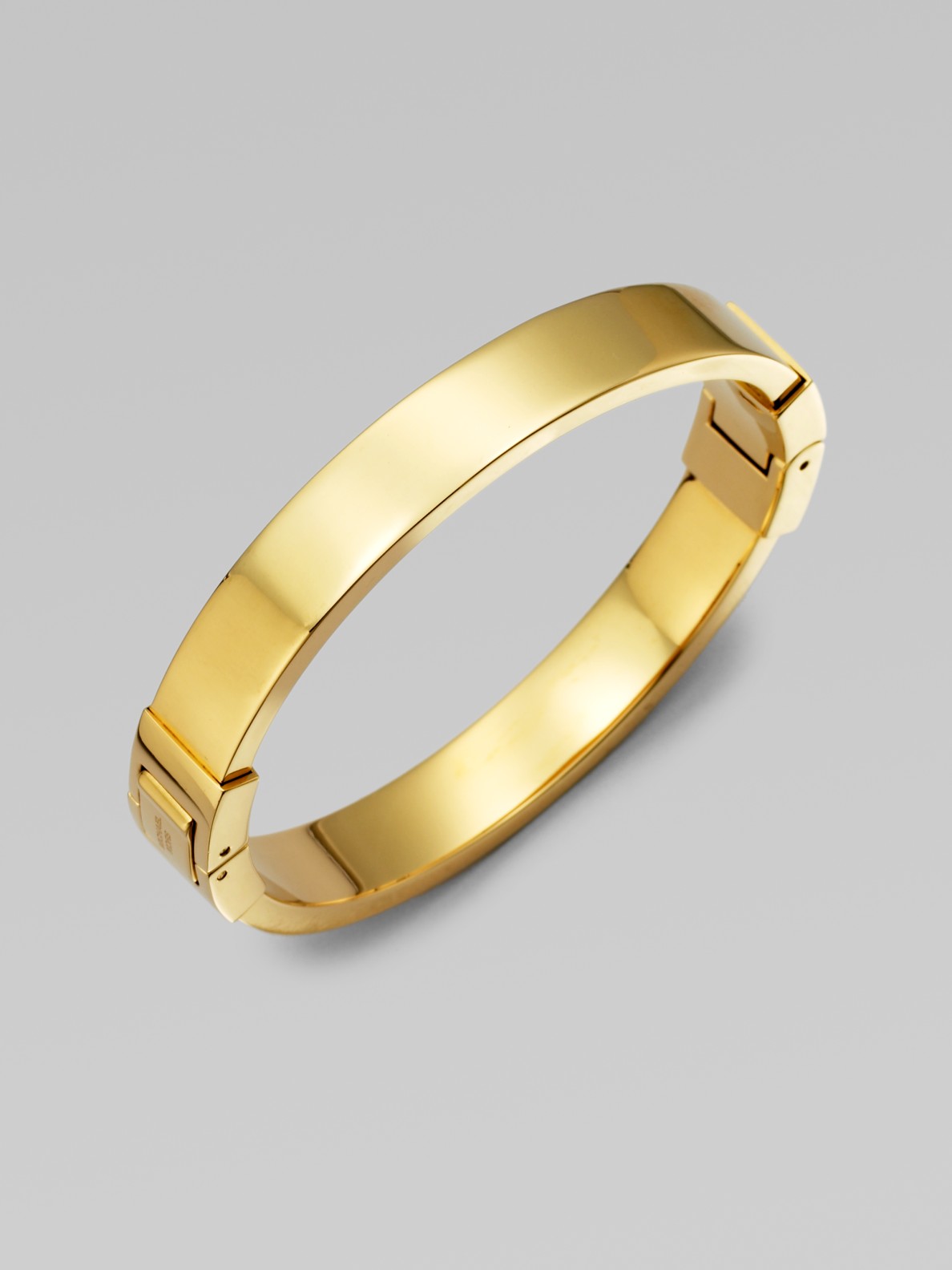 Lyst Michael Kors Narrow Hinged Bangle Bracelet Goldtone In Metallic Gallery