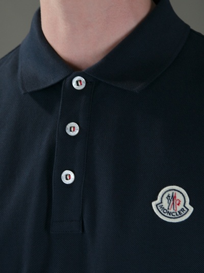 navy blue moncler polo