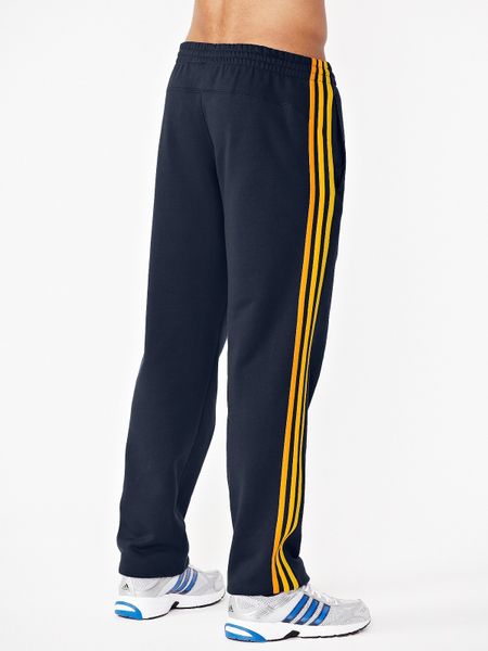 Adidas Enhanced Cuffed Sweat Pants in White for Men (blue/navy/yellow ...