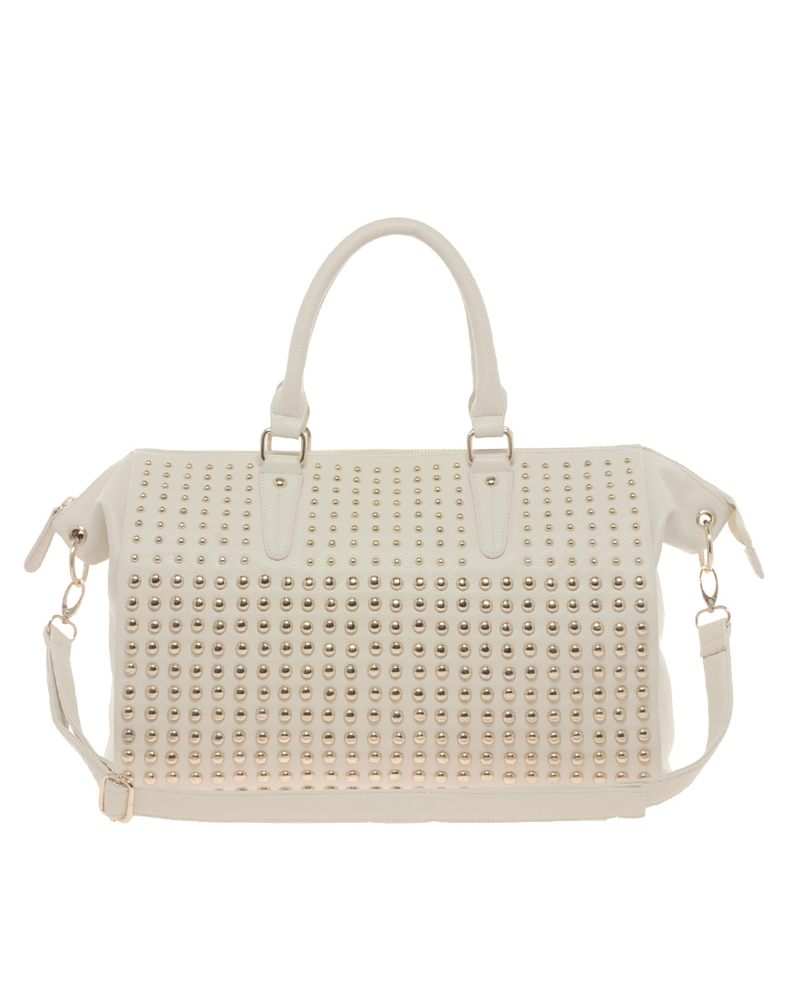 cream holdall