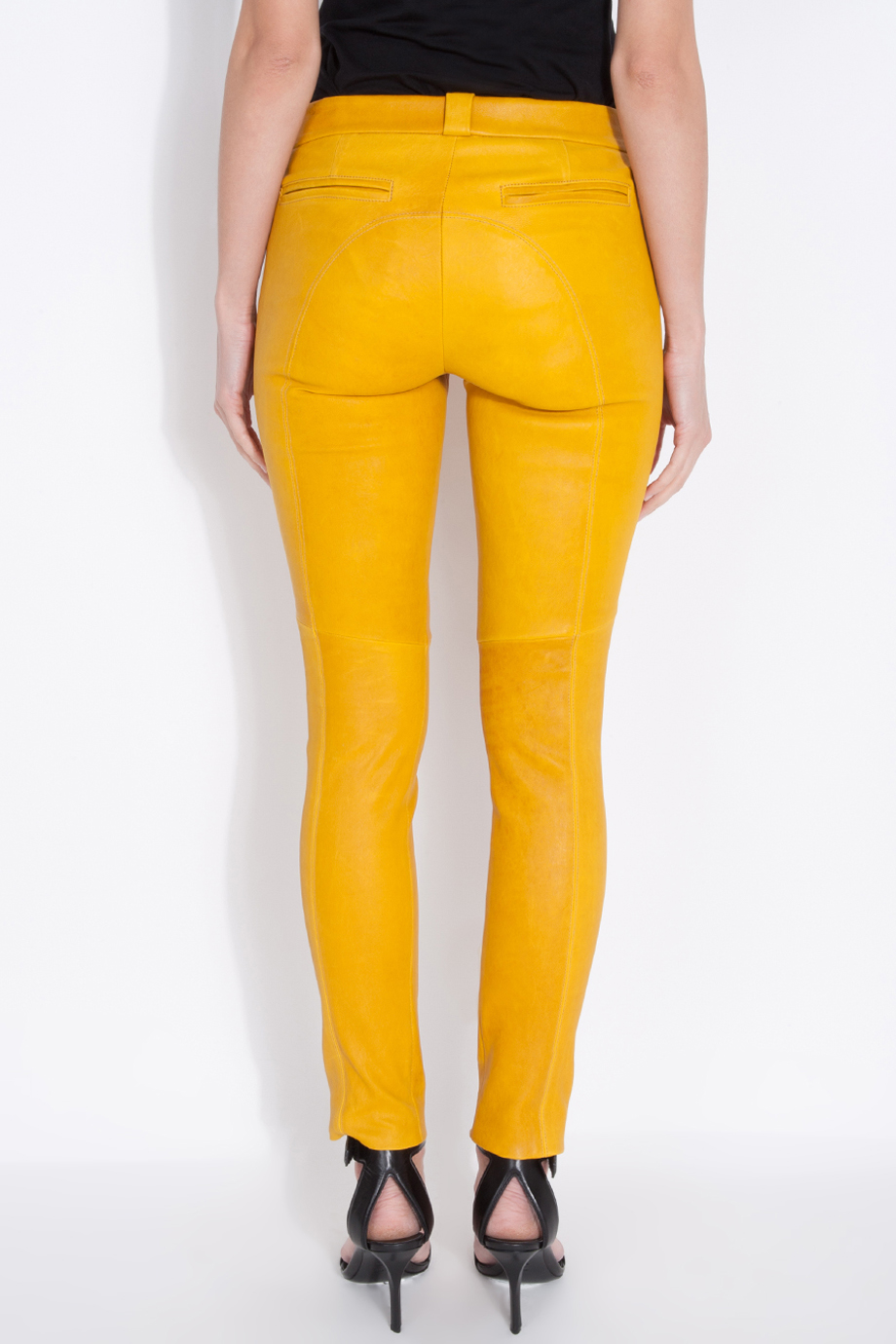 yellow top black pants