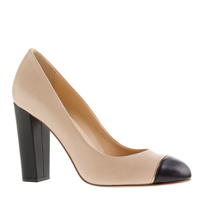 black pumps with white cap toe