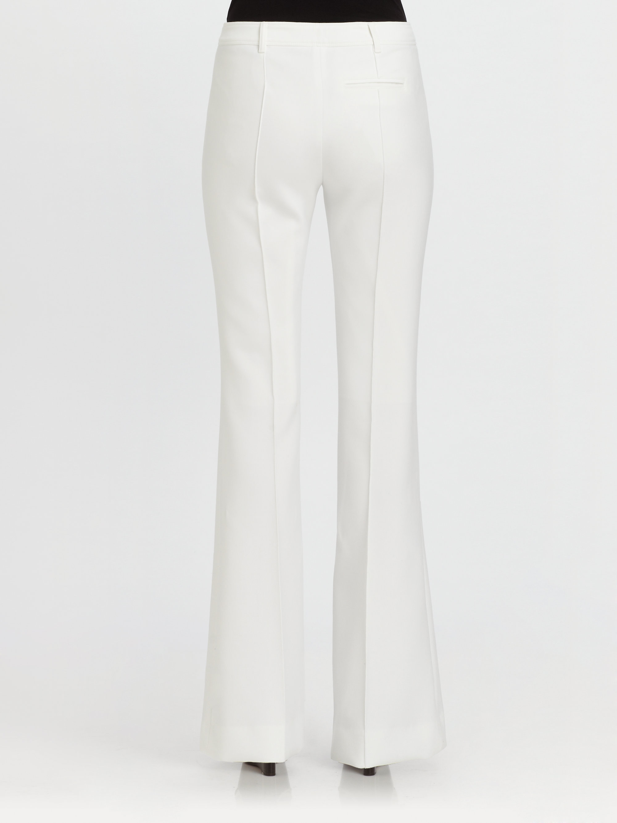 white flared trousers