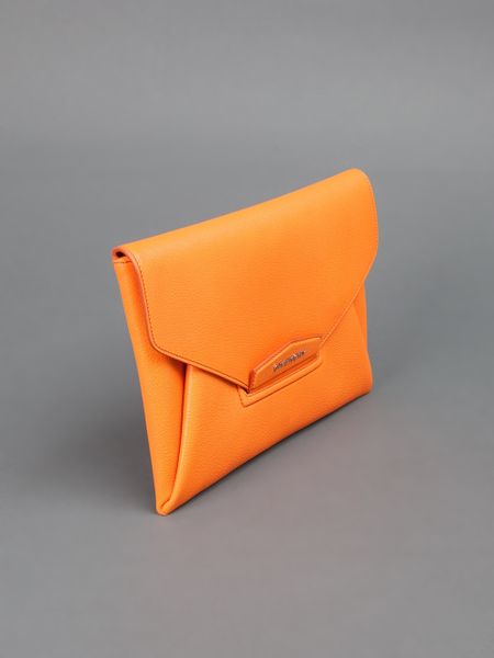 Givenchy Clutch Bag in Orange | Lyst