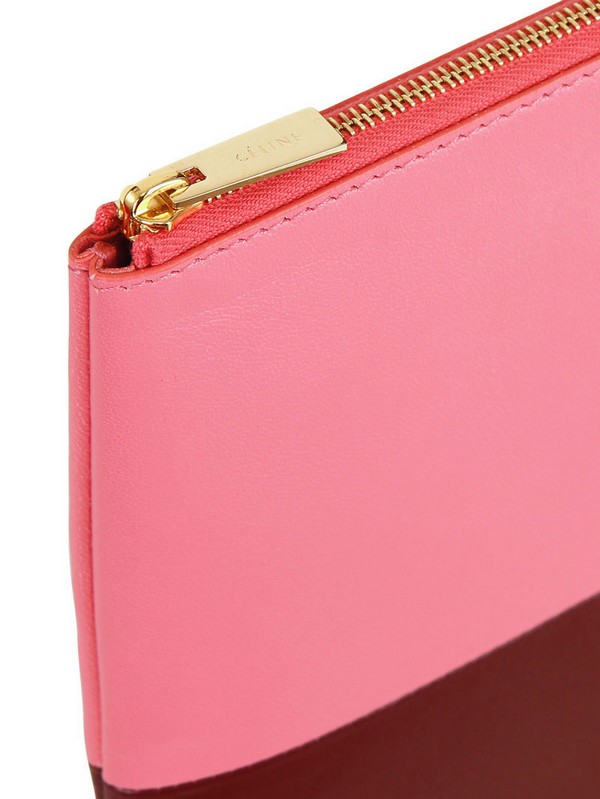 Cline Bicolored Solo Pouch Leather Clutch in Pink (pink/rust) | Lyst