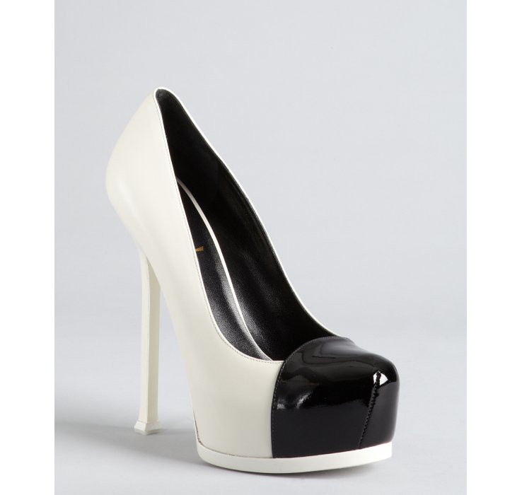 black pumps with white cap toe
