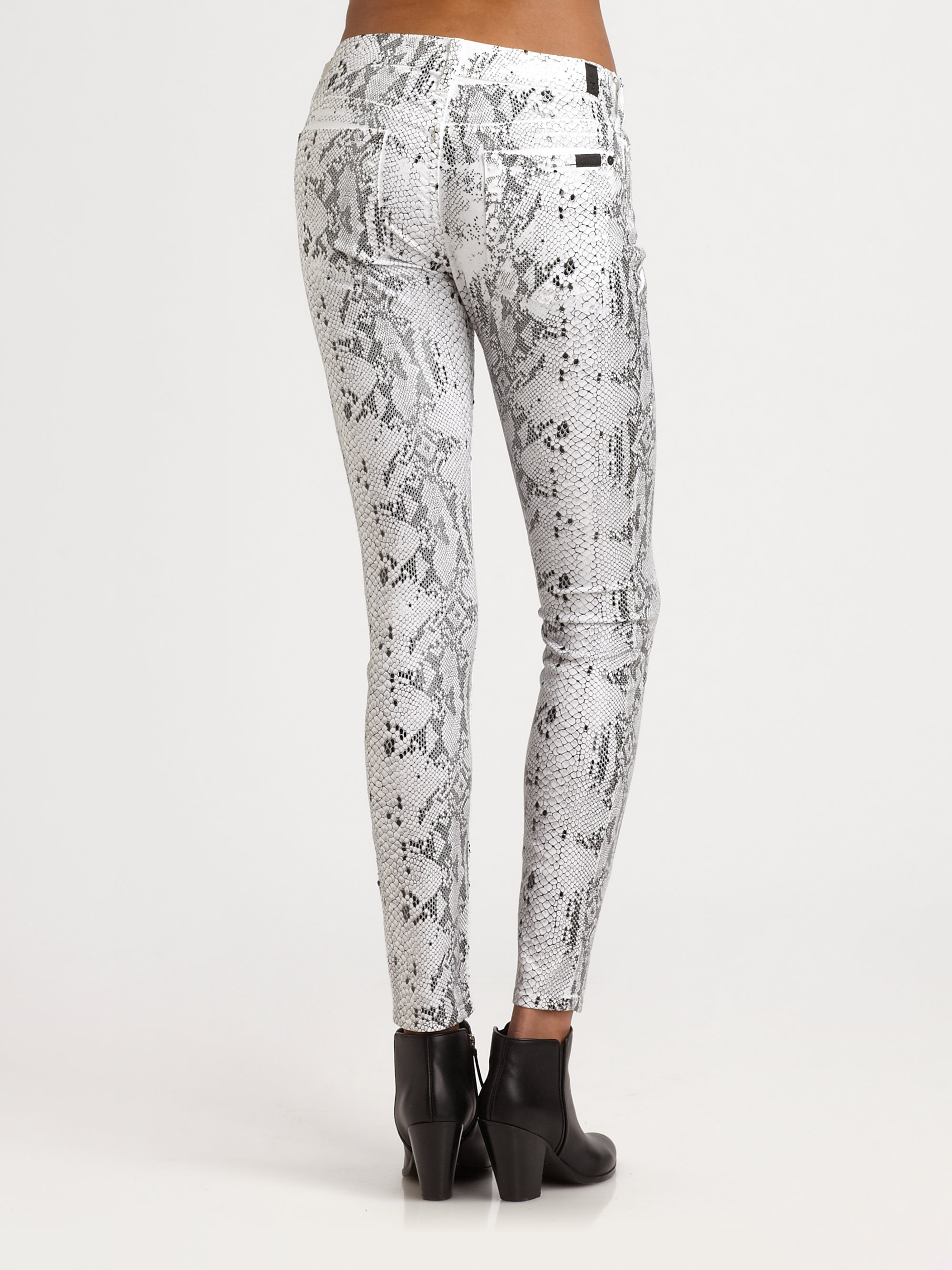 snake print bell bottom jeans