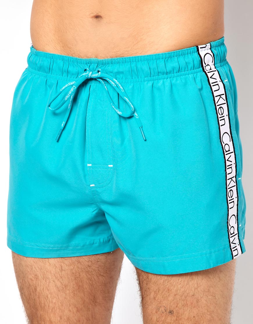 Lyst - Calvin Klein Logo Tape Swim Shorts in Blue for Men