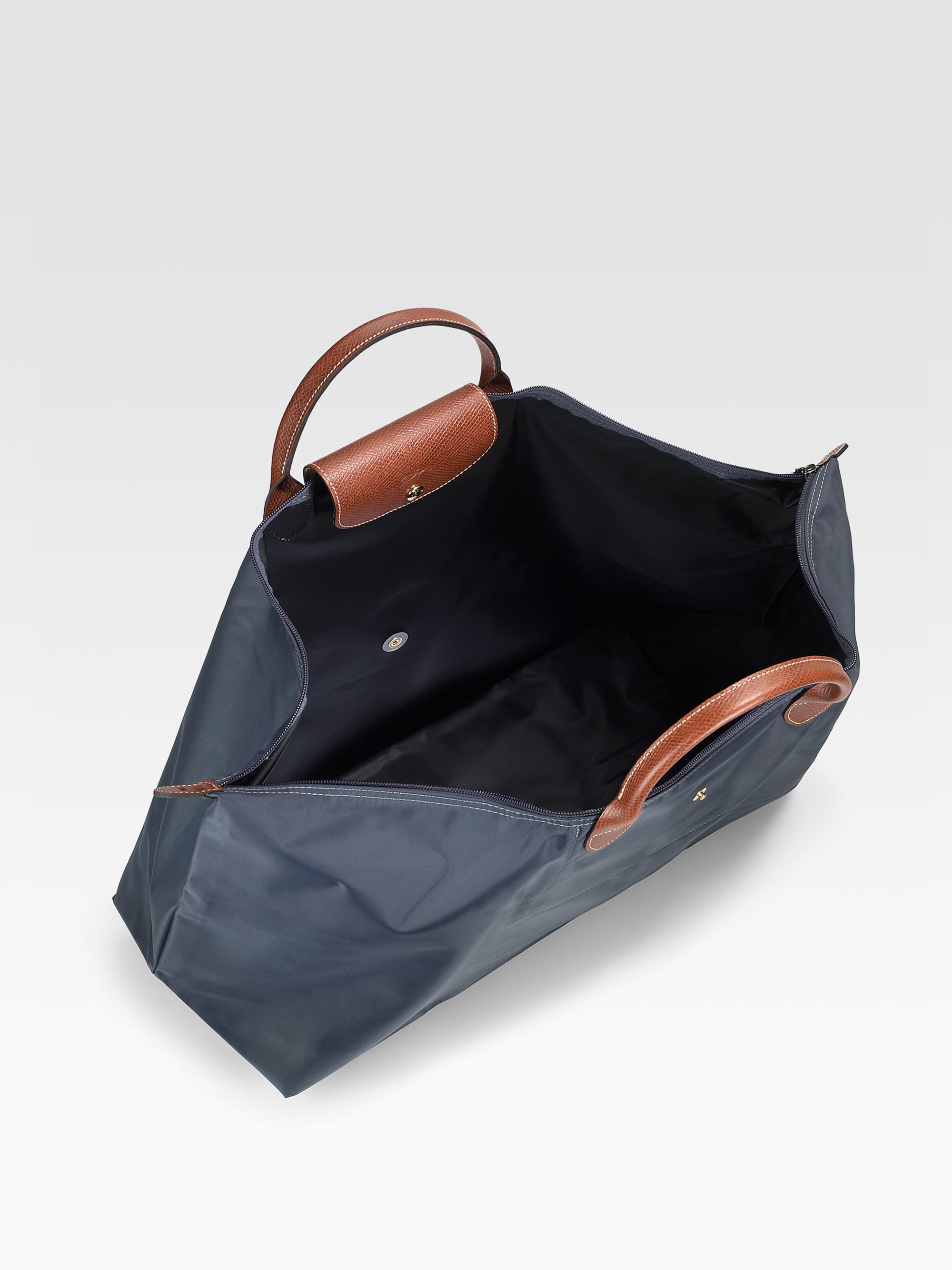 Longchamp Pliage Travel Duffle Bag in Black Lyst