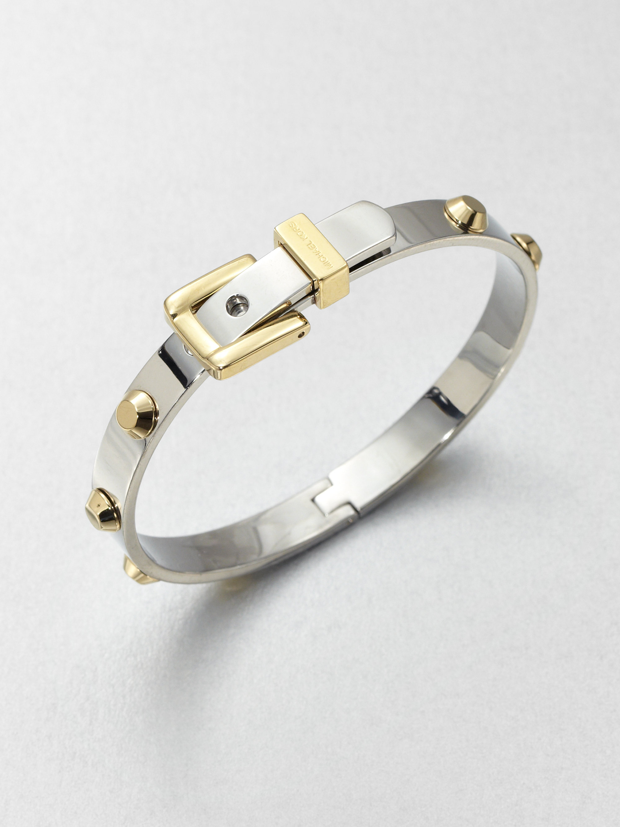 Lyst Michael Kors Astor Two Tone Rivet Buckle Bangle Bracelet In Gallery Previously Sold At Saks Fifth Avenue Women S Michael Kors Bangle