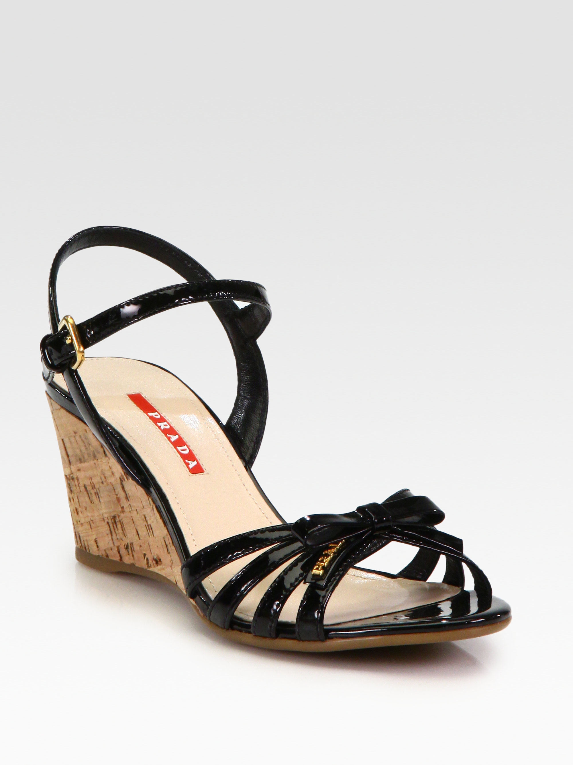 Prada Leather Bow Cork Wedge Sandals in Black | Lyst