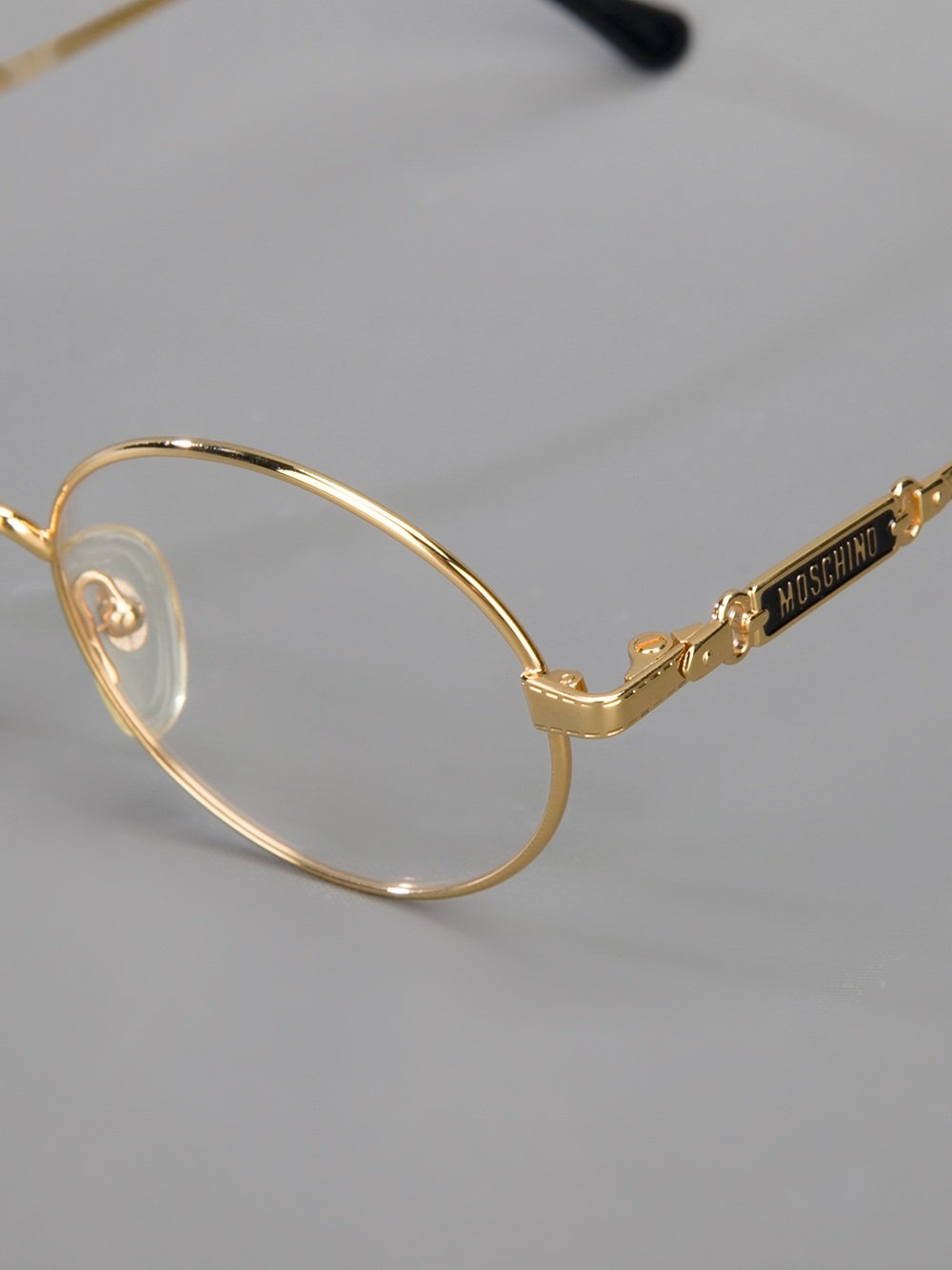 Moschino Round Frame Glasses In Metallic Lyst