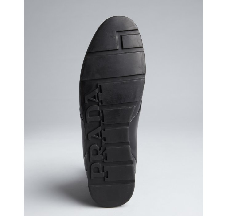 low profile black sneakers