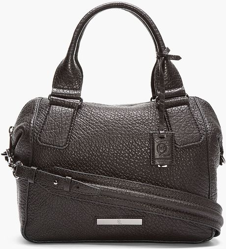 Mcq By Alexander Mcqueen Black Pebbled Leather Church Duffle Bag in ...