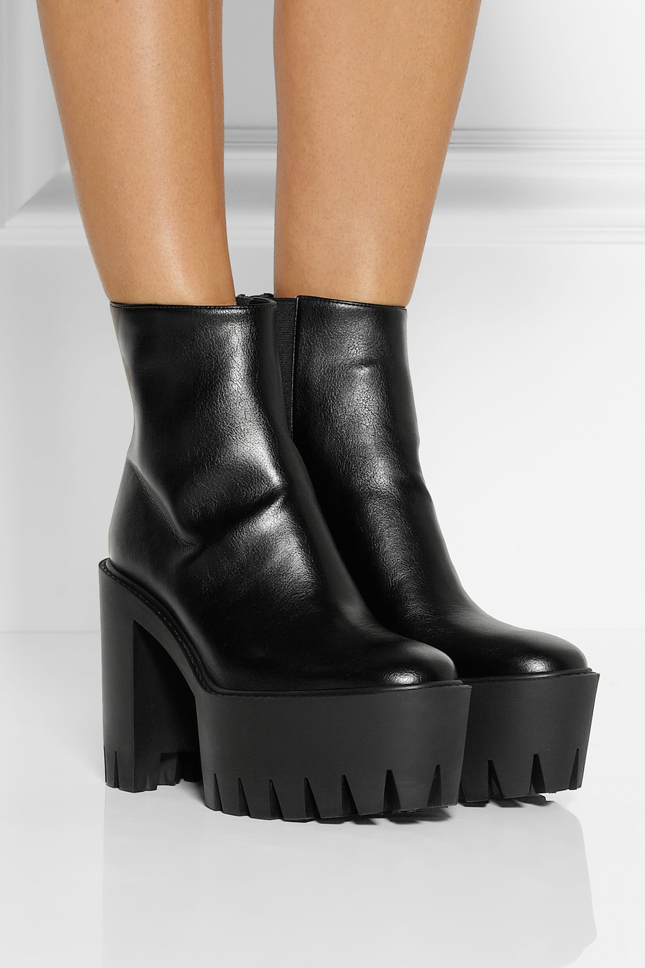 square it's a faux leather platform boots