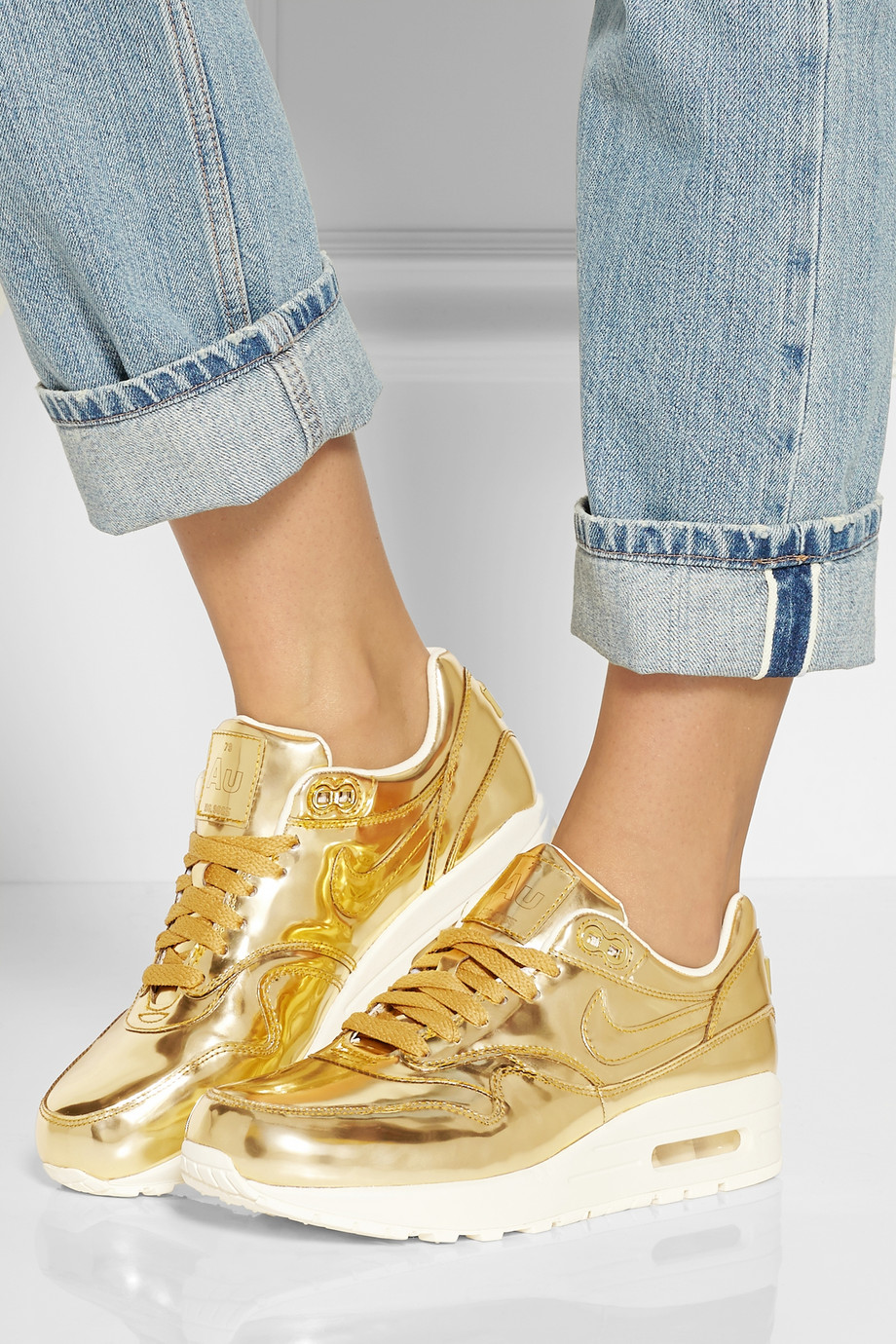 gold nike trainers womens
