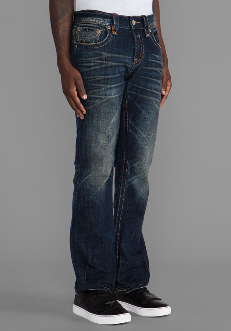 dark blue rock revival jeans