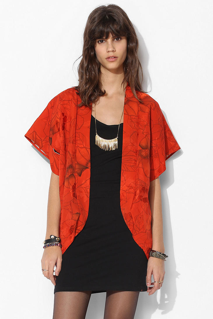 urban outfitters orange crop top