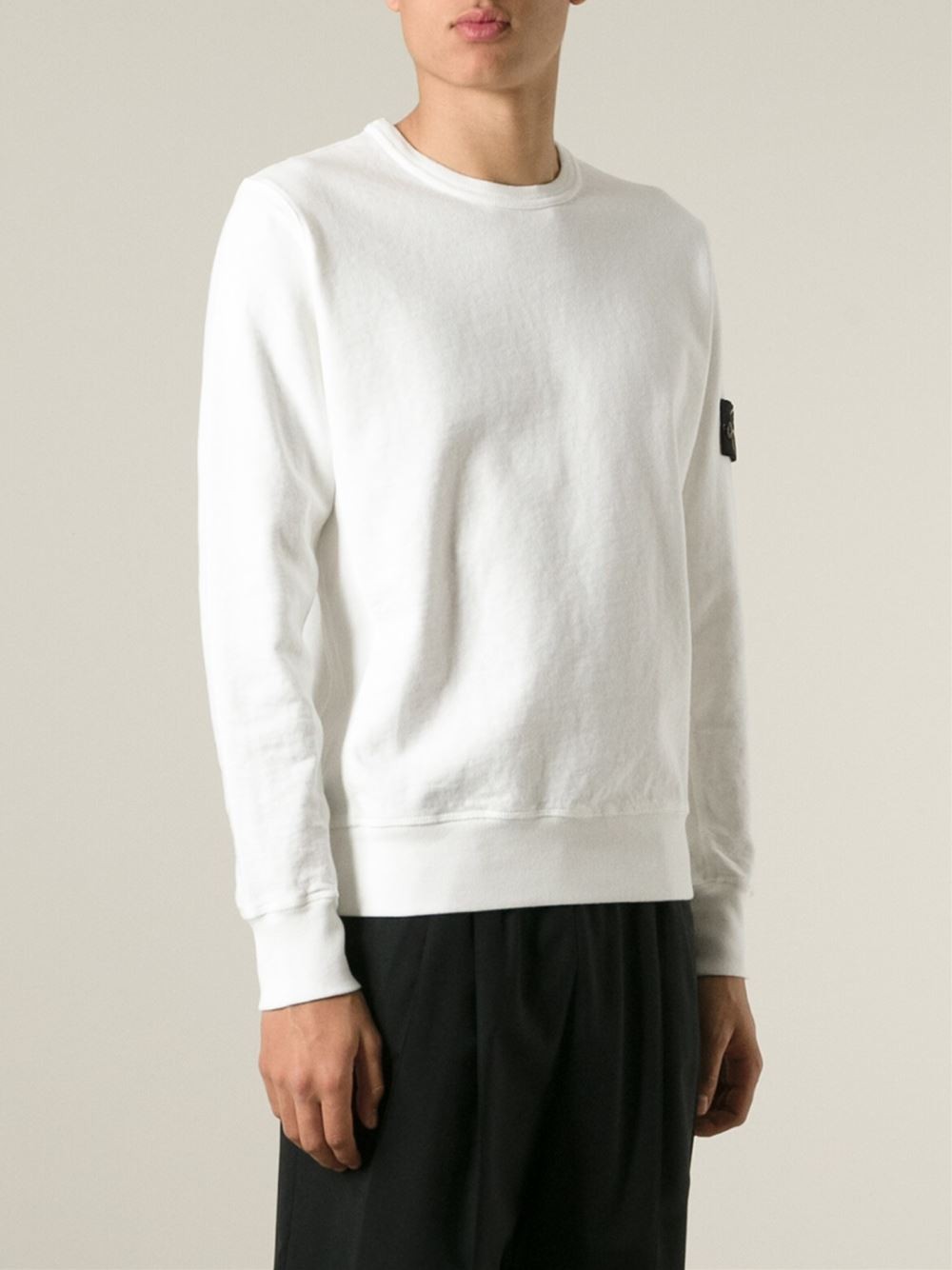 white crewneck and sweatpants