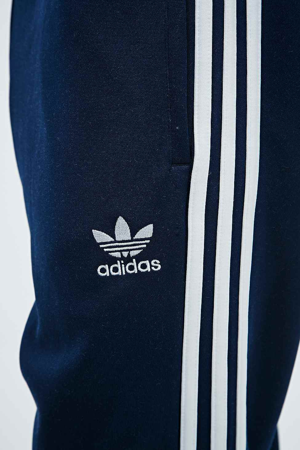 navy blue adidas tracksuit bottoms