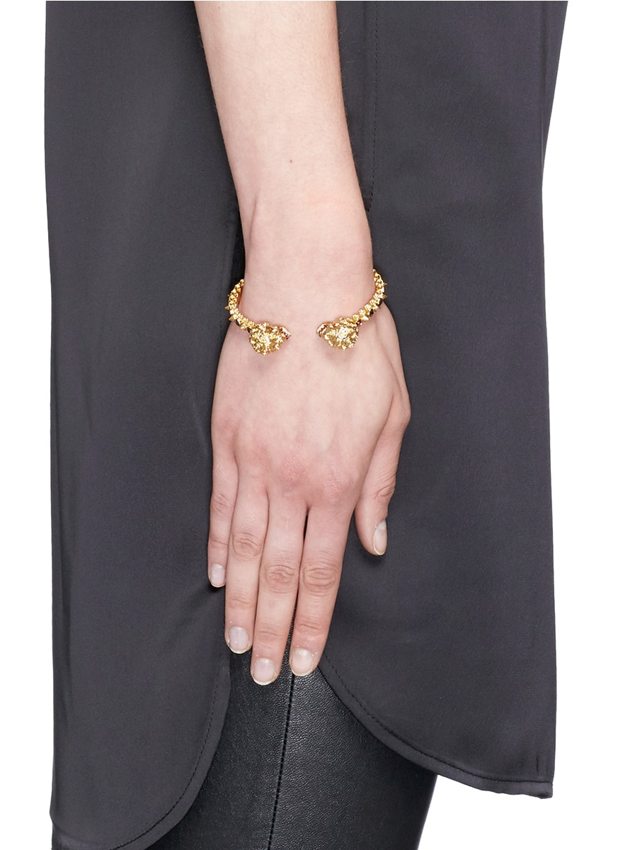 Lyst Alexander Mcqueen Punk Rose Twin Skull Cuff In Metallic Gallery