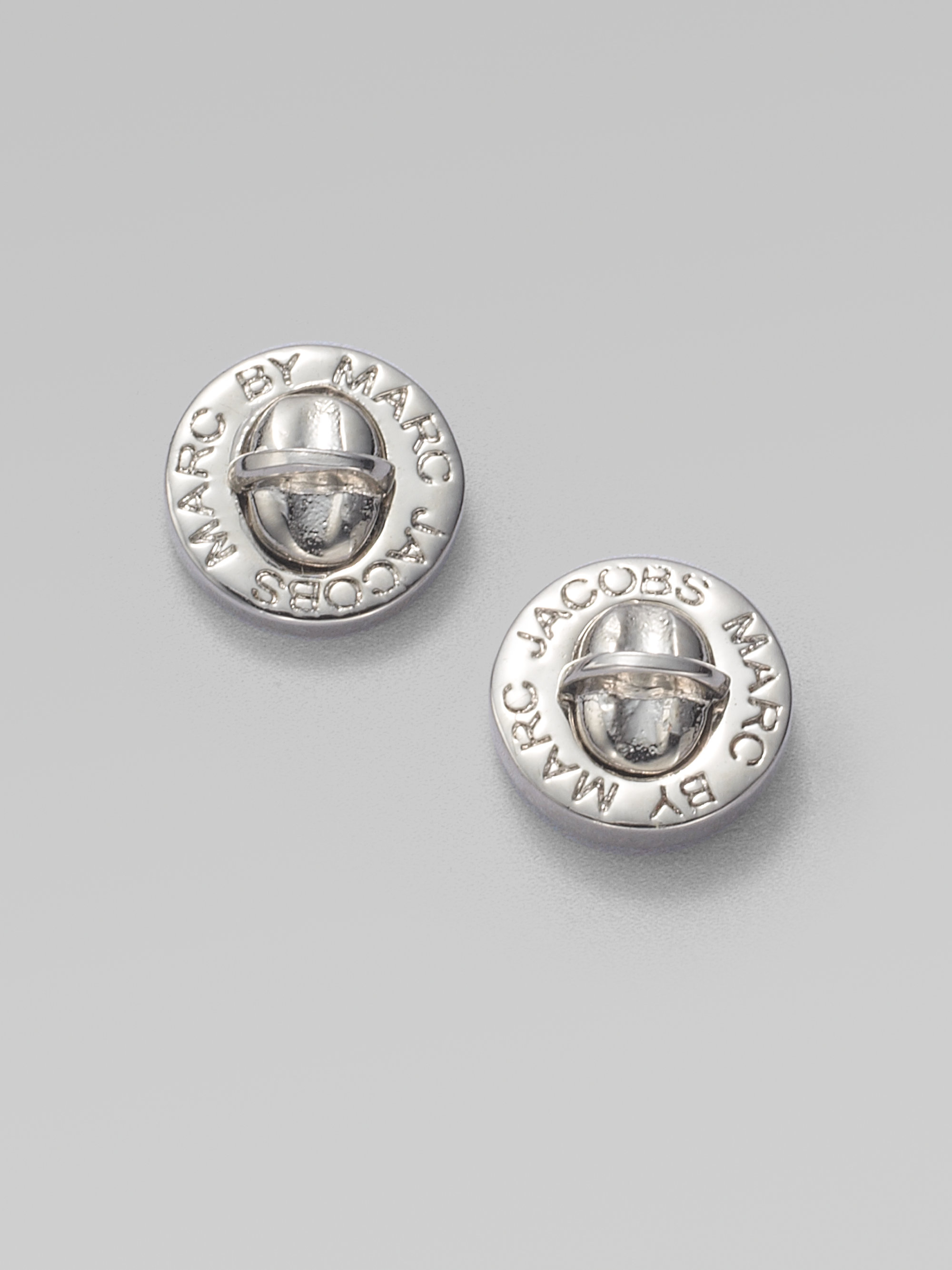 Lyst Marc By Jacobs Turnlock Stud Earrings In Metallic Gallery