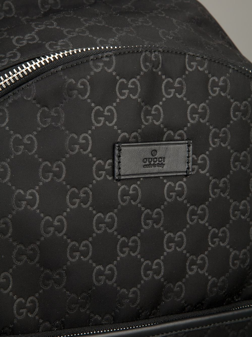 gucci embossed backpack