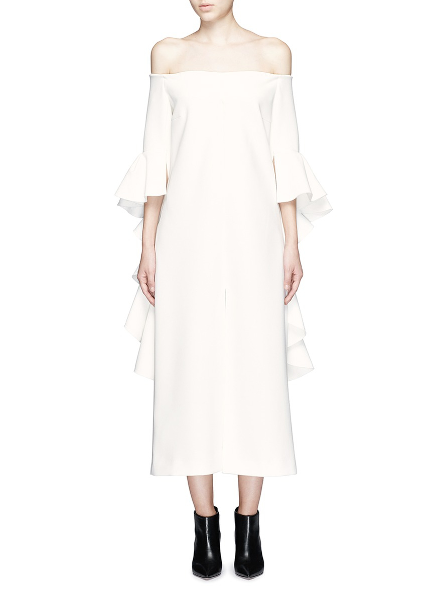 Explore our latest range of mid length dresses featuring skater shapes, peplum styles and satin finishes.Go lacy and strappy for the cocktail party or stand out in a Bardot fishtail midi dress.An off the shoulder wrap bodycon is a style essential while a long sleeve midi dress is a 9 to 5 winner.