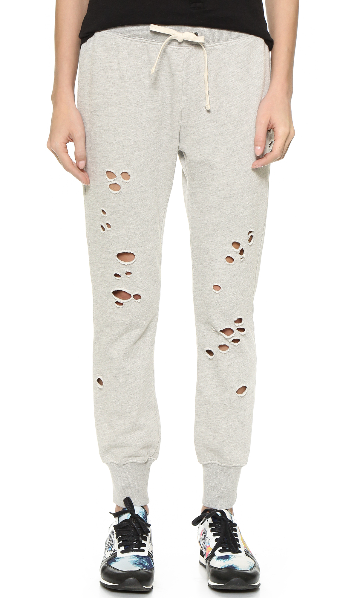 sweatpants with holes in knees