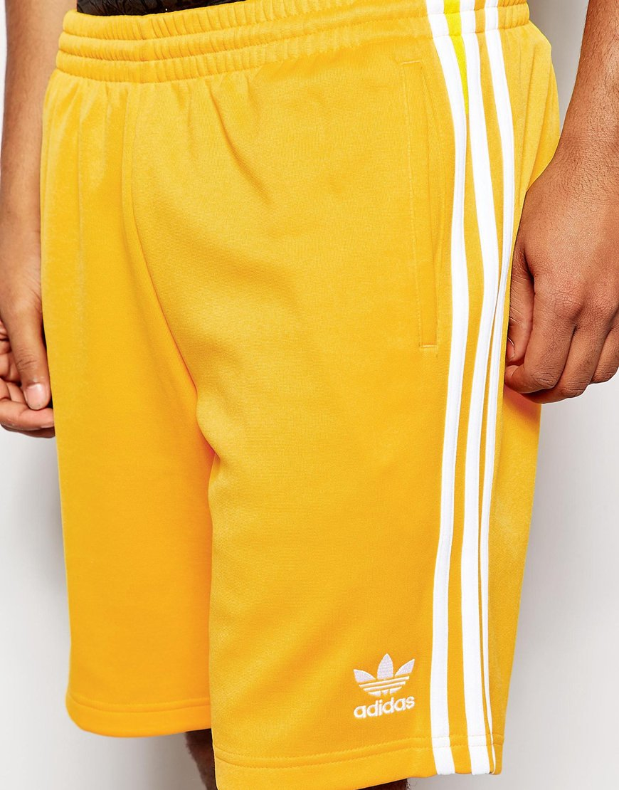 Lyst - Adidas Originals Shorts in Yellow for Men
