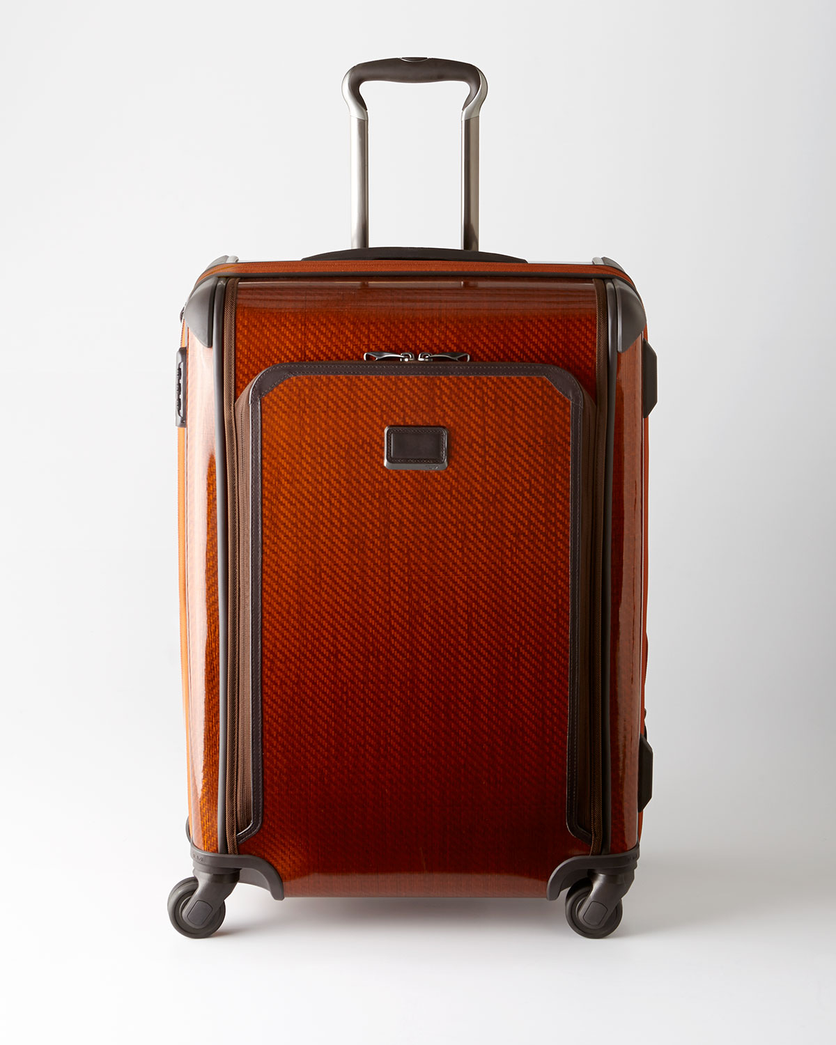 tumi orange luggage