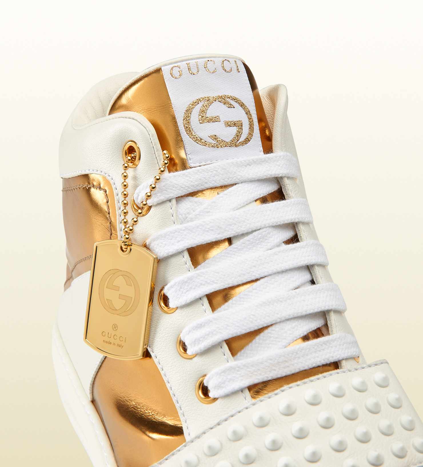 gold gucci tennis shoes