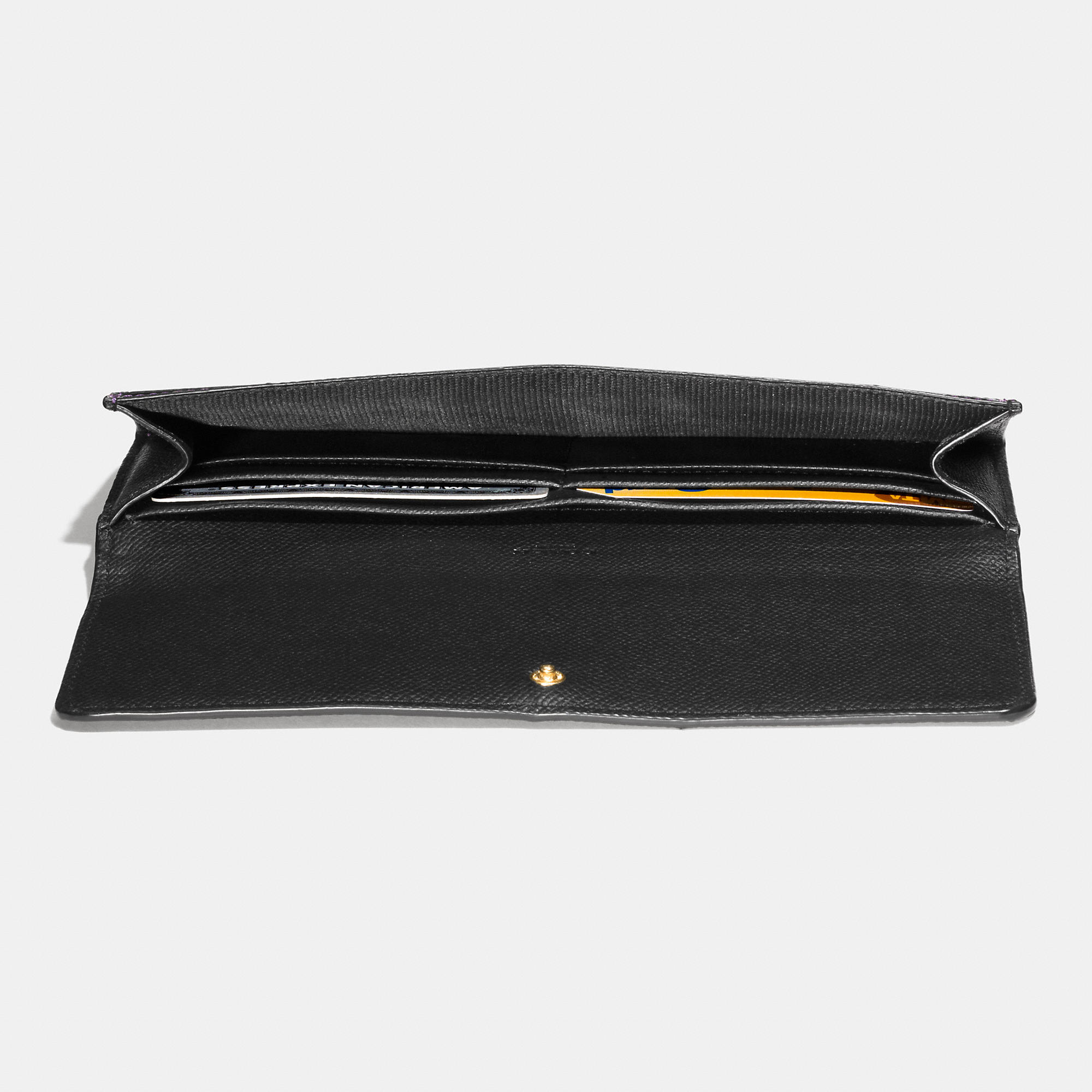 coach wallets blacklight