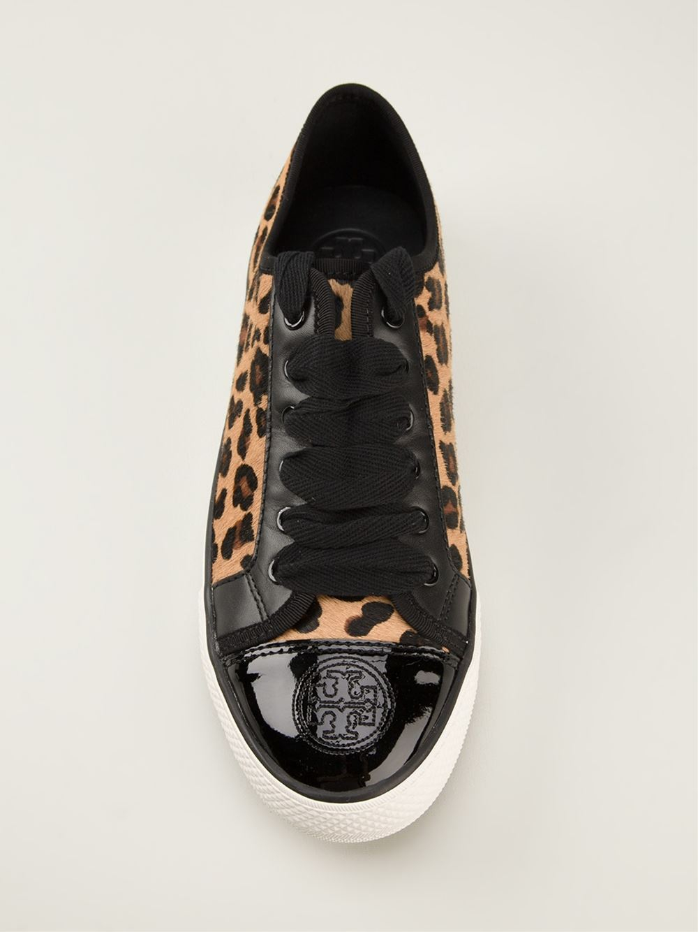 leopard print and black trainers