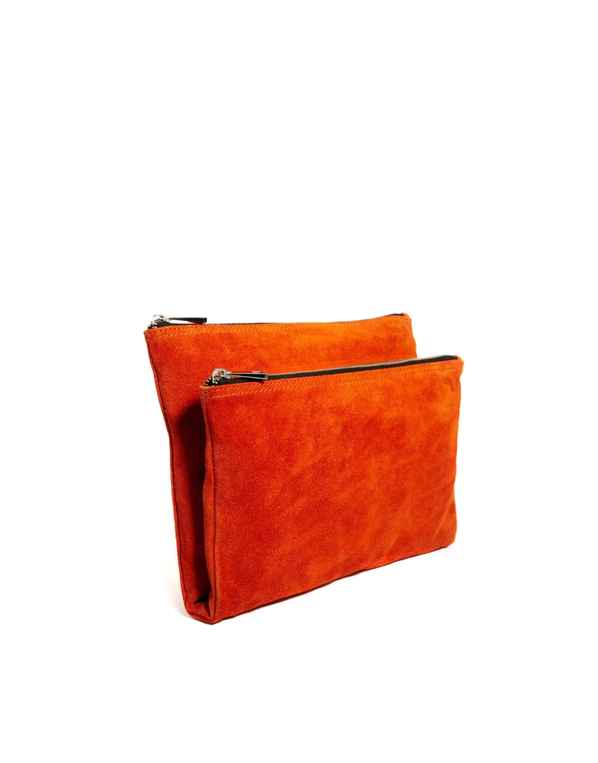 orange suede clutch bag