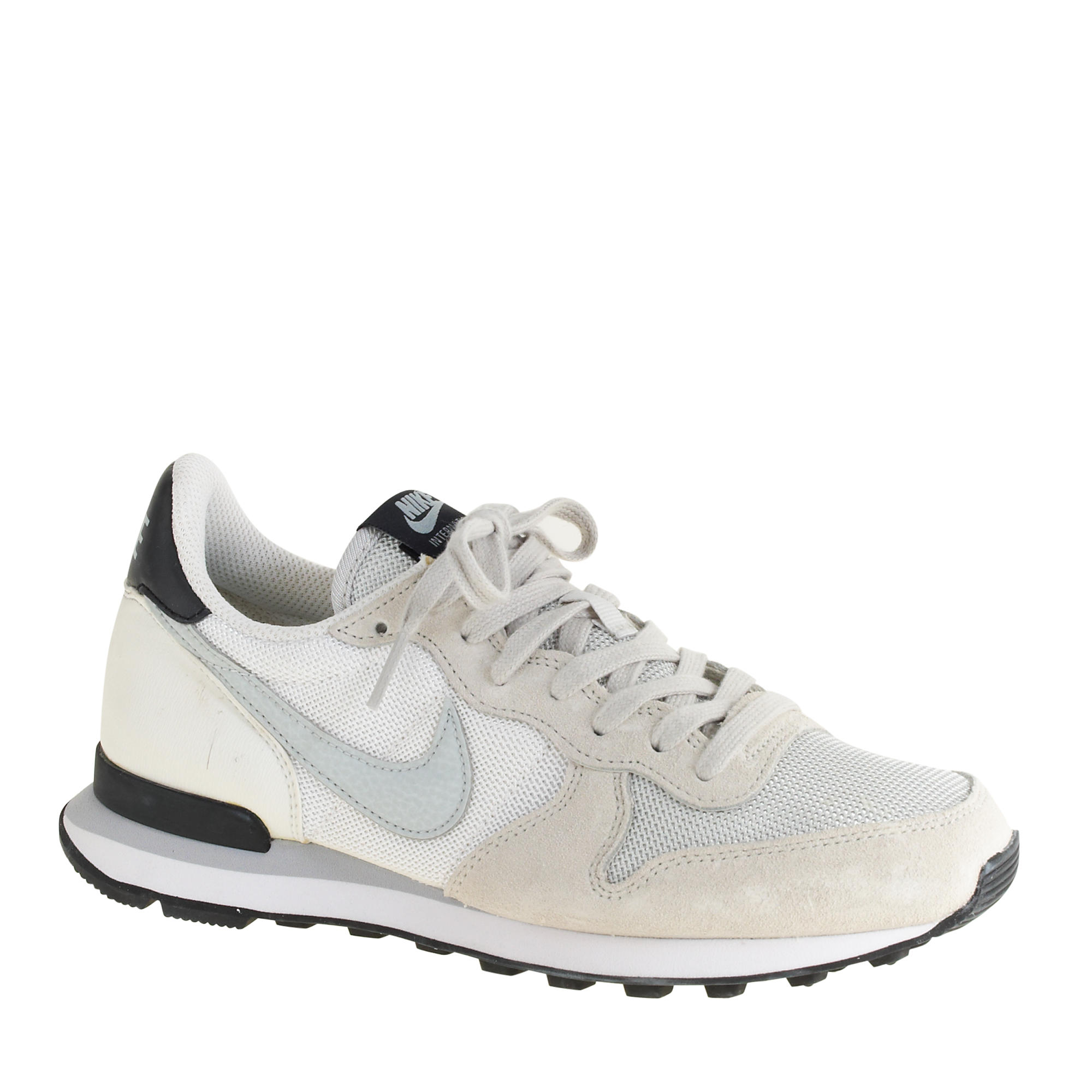 gray women's nike sneakers