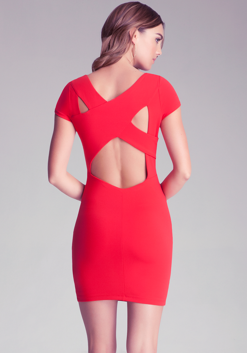 Lyst - Bebe Asymmetrical Cut-out Dress in Red