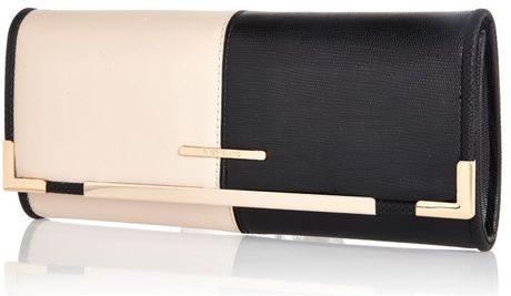 black cream clutch bag