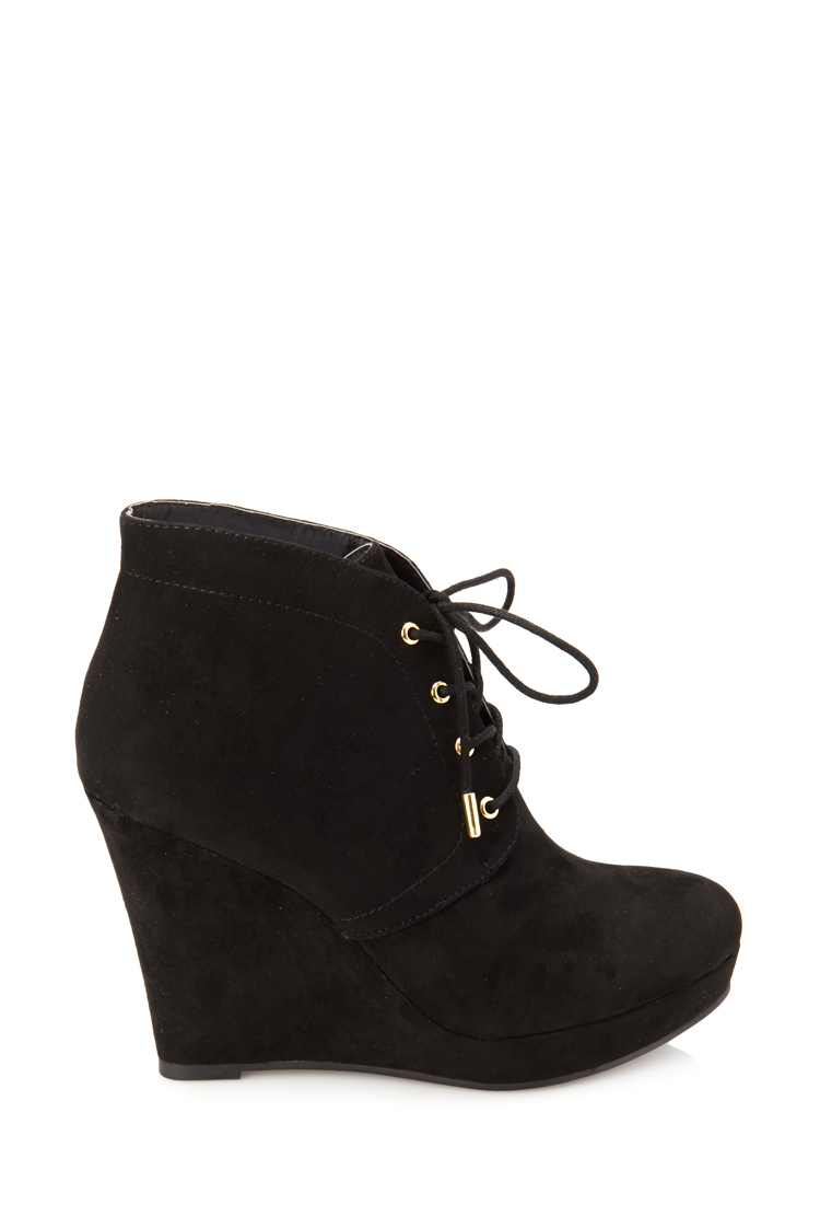 black wedge booties with conchos