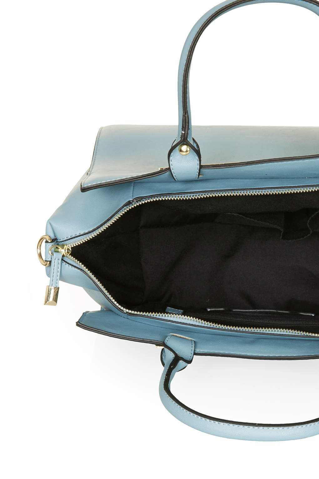 blue holdall bag