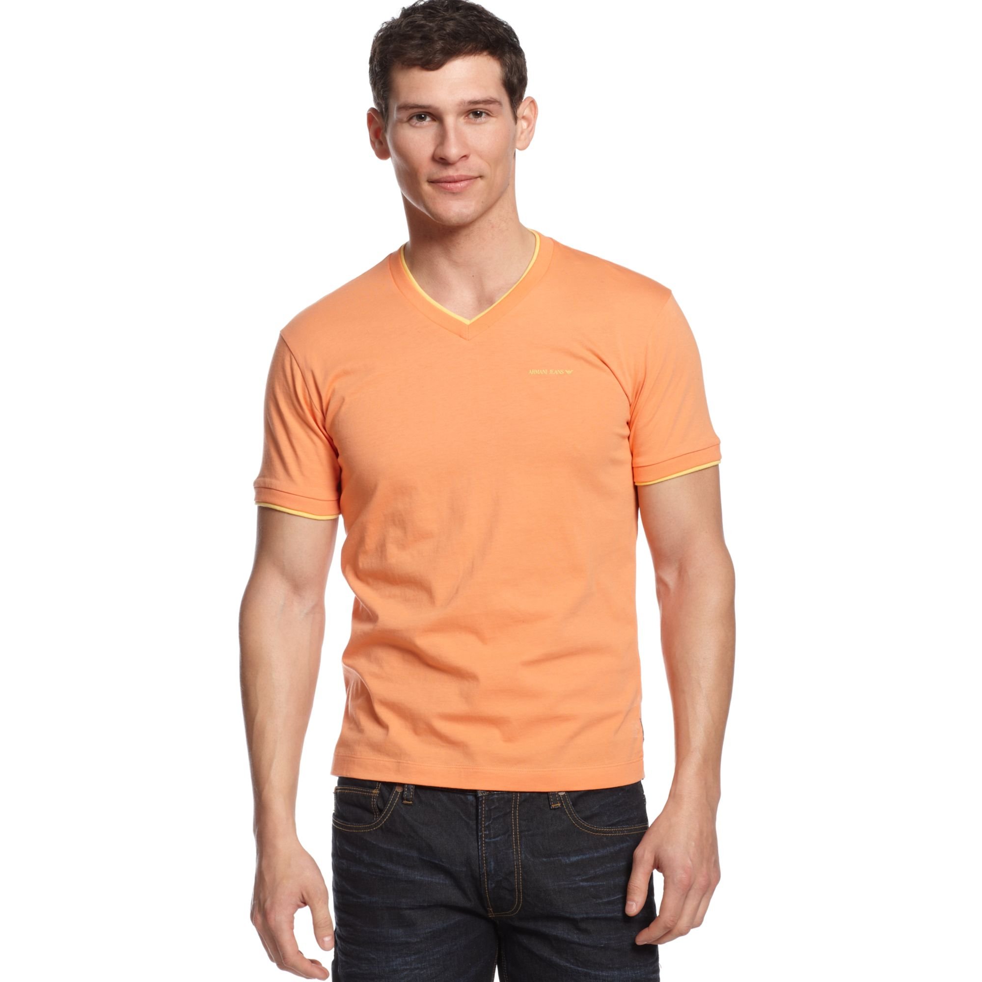 jeans with orange shirt