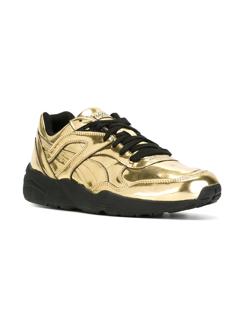 gold puma sneakers