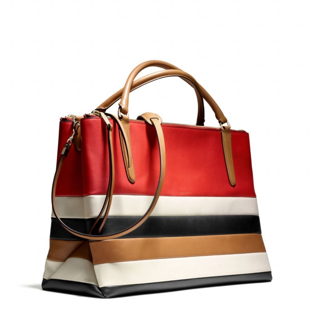 coach bag with red stripe