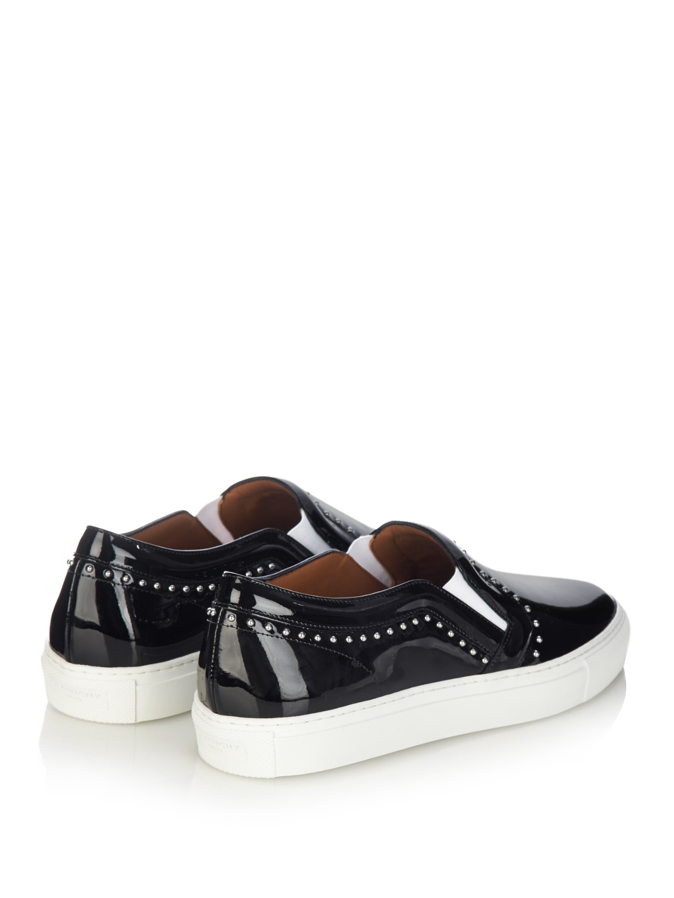 black trainers with studs