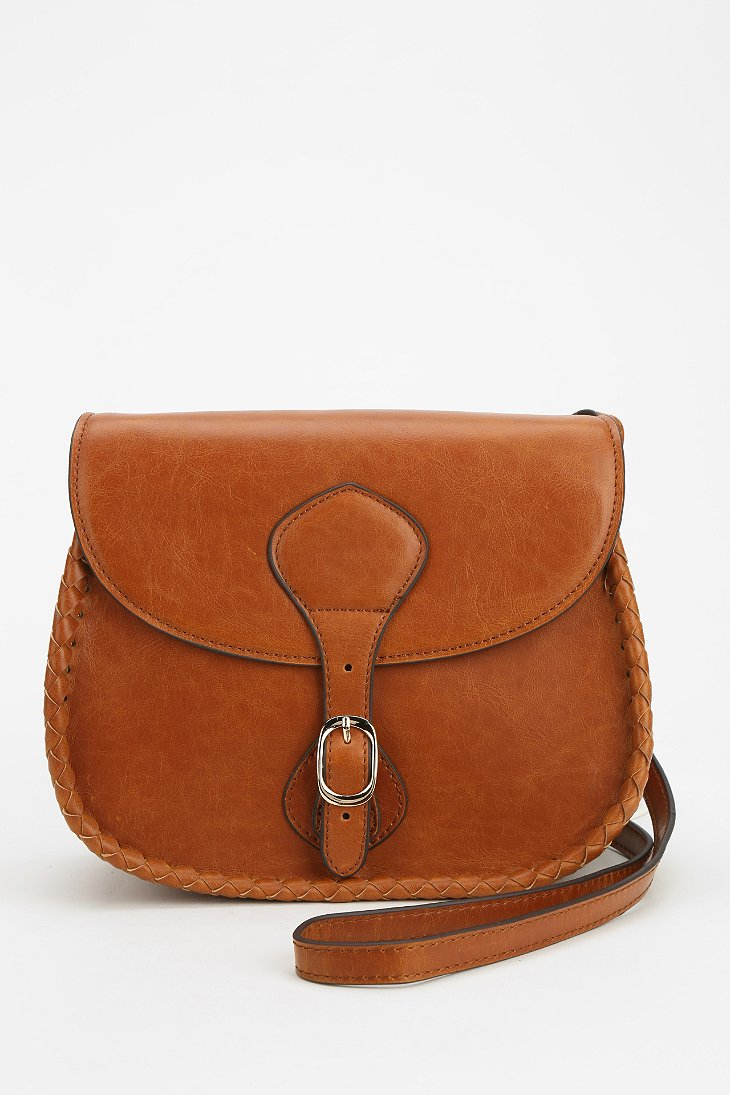 Lyst Urban Outfitters Whipstitch Crossbody Saddle Bag in Brown