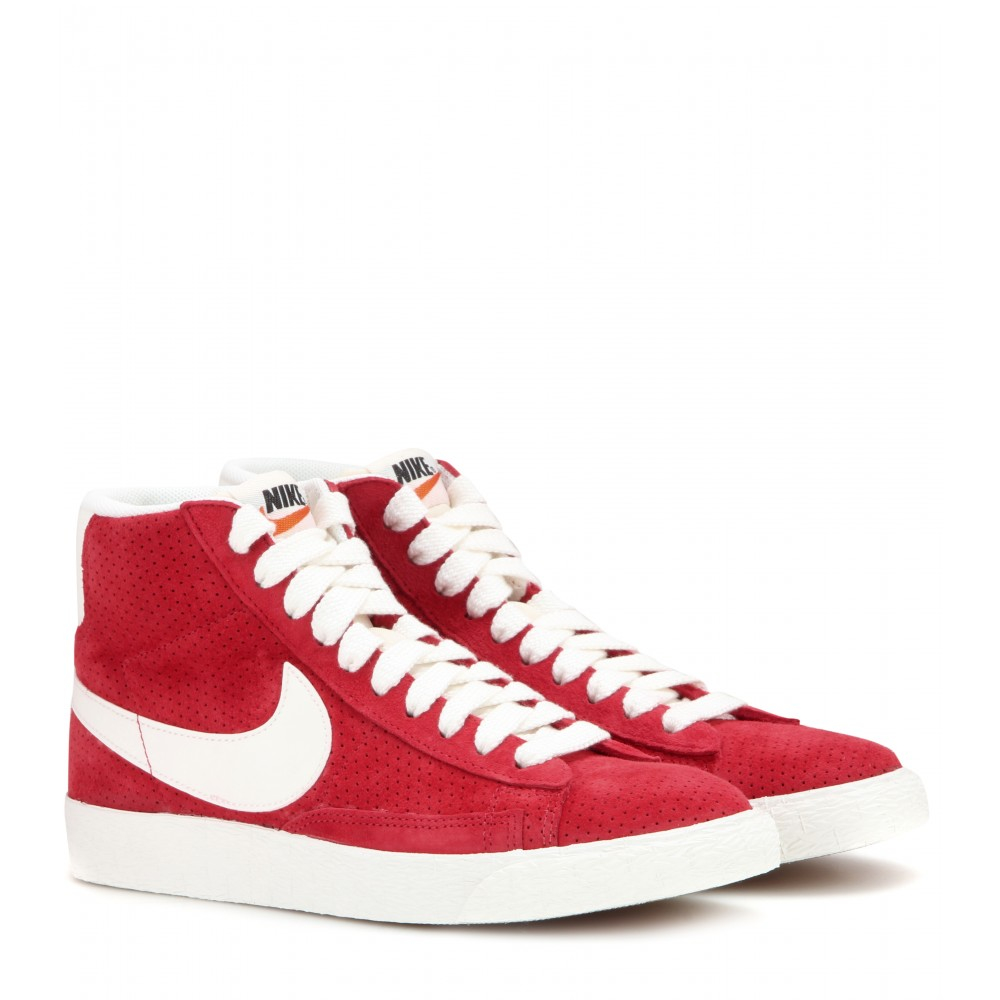 red and white nike high tops